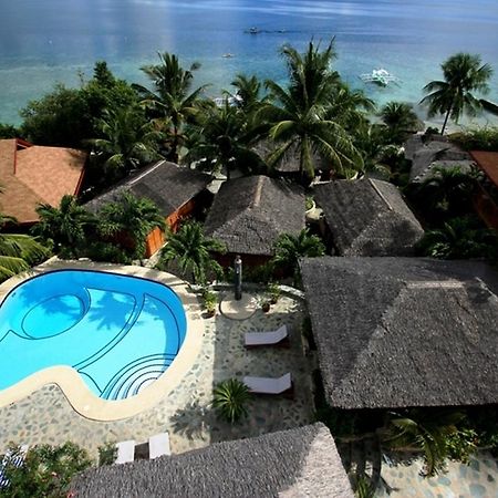 แมจิก ไอส์แลนด์ ไดฟ์ รีสอร์ต Hotel โมอัลโบอัล ภายนอก รูปภาพ