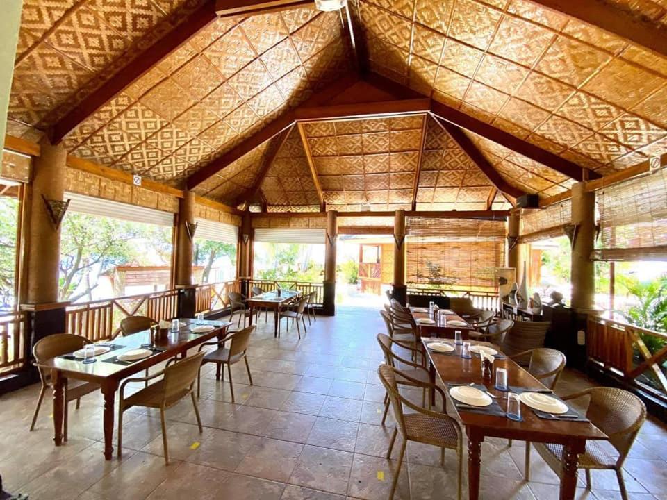 แมจิก ไอส์แลนด์ ไดฟ์ รีสอร์ต Hotel โมอัลโบอัล ภายนอก รูปภาพ