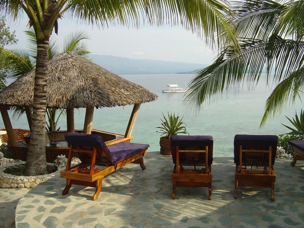 แมจิก ไอส์แลนด์ ไดฟ์ รีสอร์ต Hotel โมอัลโบอัล ภายนอก รูปภาพ