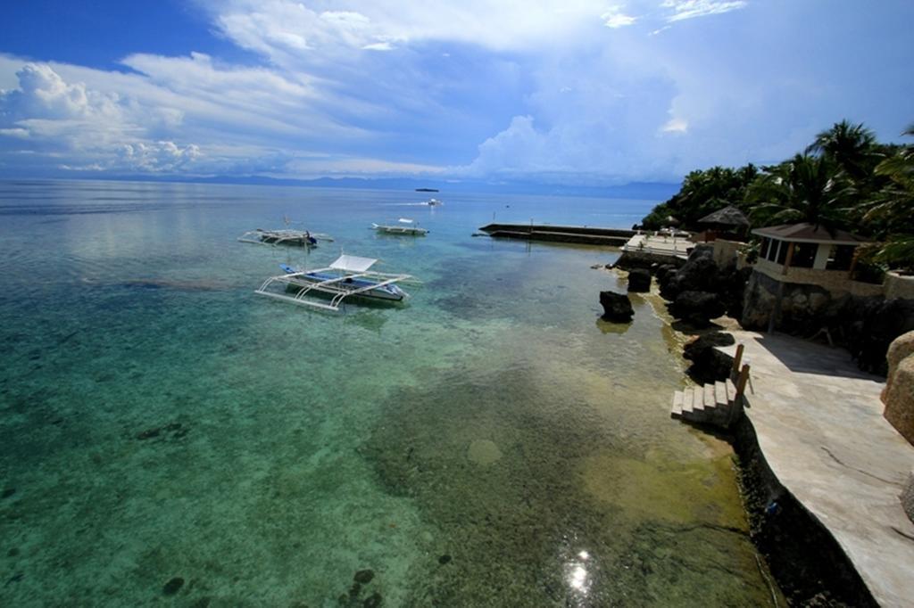 แมจิก ไอส์แลนด์ ไดฟ์ รีสอร์ต Hotel โมอัลโบอัล ภายนอก รูปภาพ